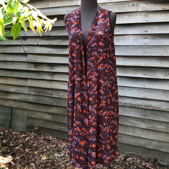 LuLaRoe Tops - New Lularoe Joy Vest feathers